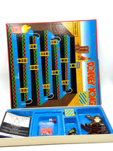 Load image into Gallery viewer, Contents of 1984 Donkey Kong board game showing pieces and board
