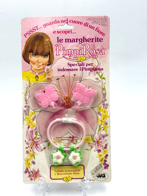 Front view of 1983 Hasbro Charmkins Pimpi Rosa Italian edition with butterfly earrings and necklace