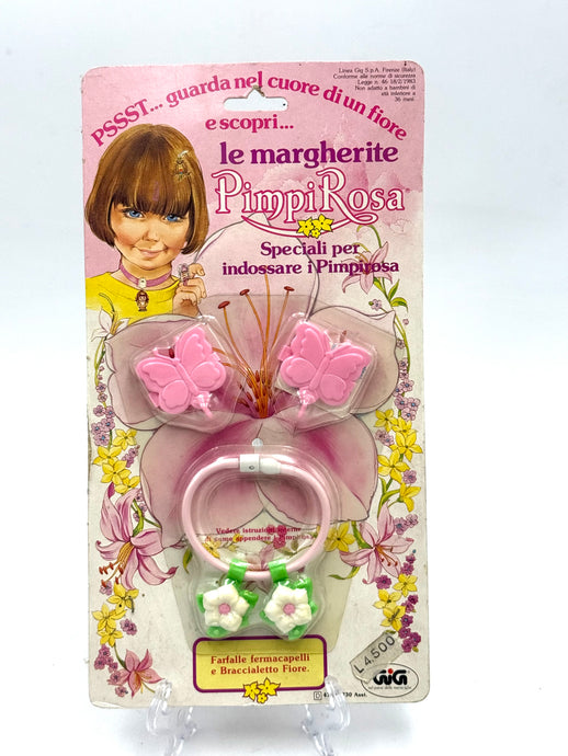 Front view of 1983 Hasbro Charmkins Pimpi Rosa Italian edition with butterfly earrings and necklace