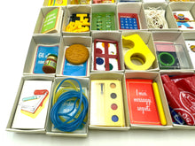 Load image into Gallery viewer, Detail of individual mini boxes with retro graphics and possible toy contents


