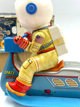 Load image into Gallery viewer, Side view of vintage Masudaya Tin Litho Space Scooter astronaut toy tested working
