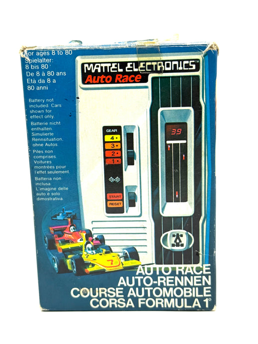Front view of 1976 Mattel Auto Race vintage handheld electronic racing game with original box
