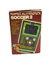 Load image into Gallery viewer, Side view showing controls of 1979 Mattel Soccer console
