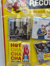 Load image into Gallery viewer, Detail of miniature vinyl record grooves from Pointer Products Mighty Tiny set

