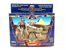 Load image into Gallery viewer, Front view of vintage Ramses Golden Pharaoh action figure in original sealed packaging



