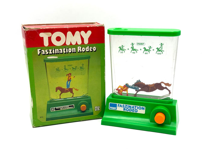 Front view of Rompin Cowboy Tomy Water Games 1980 Rodeo boxed